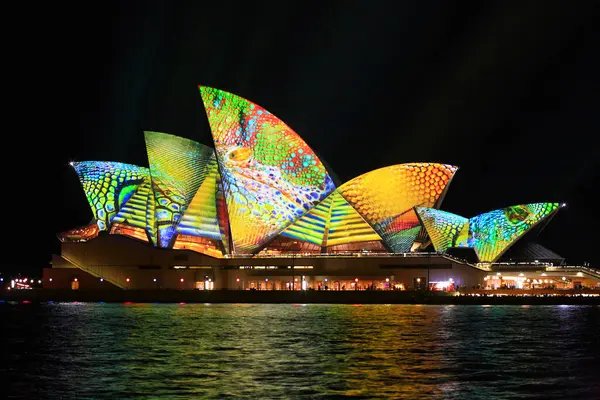 Opera house in summer colours of lime, aqua, yellow and orange