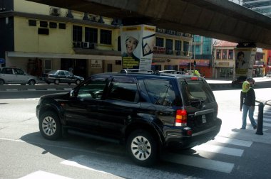 Kuala Lumpur karayolu trafiği. Asya konseptini gezmek