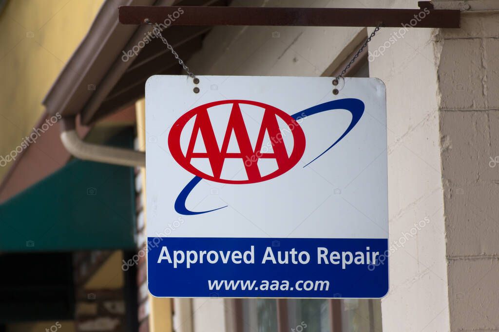 AAA Sign in Front of Auto Repair Garage