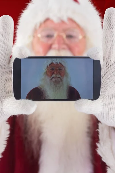 Złożony Obraz Santa Rejestruje Się Smartphone — Zdjęcie stockowe