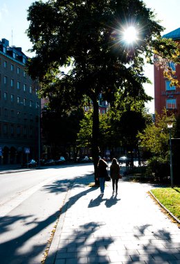 Beautiful architecture and people walking on the street in Stockholm, Sweden           