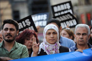 TURKEY, Istanbul: Kurdish community members and supporters hold a protest in Istanbul on Sept. 13, 2015 to call for an end to a recent government operation against Kurdish militants in Cizre