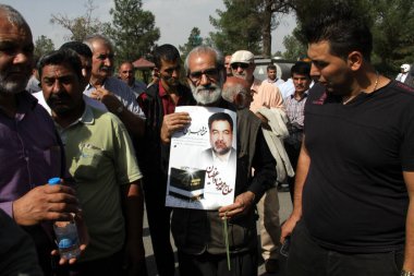 İRAN, Tahran: Behesht-e Zahra mezarlığı 4 Ekim 2015 'te Mena trajedisinin anısına. 24 Eylül 2015 'teki hac ayinlerinde büyük çaplı izdihamda toplam 465 İranlı hacı hayatını kaybetti..