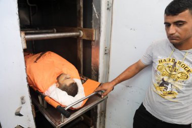 GAZA, Deir al-Balah: Relatives of the Palestinian militant Ahmed al-Sirhi, who was killed by Israeli forces on Tuesday, mourn during his funeral in Deir al-Balah in the central Gaza Strip October 21, 2015.