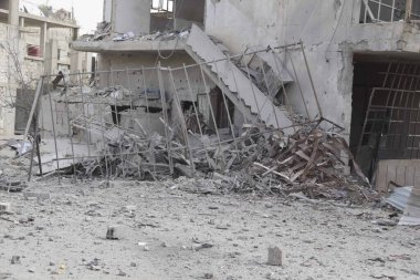 SYRIA - HAVASTA 'DA SONRA, köydeki binaları yıktı