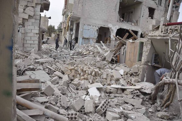 SYRIA - AIRSTRIKE - AFTERMATH IN HARASTA,destroyed buildings in the village