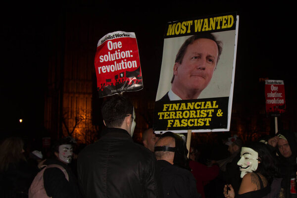 LONDON, UK - MARCH 1TH 2014. London protesters march against worldwide government corruption. In London on 1th March 2014