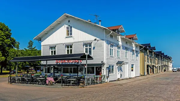 Stock image Wooden houses in the town 