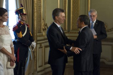 ARGENTINA, Buenos Aires: Arjantin Cumhurbaşkanı Mauricio Macri (ortada) 10 Aralık 2015 tarihinde Buenos Aires 'te Arjantin Ulusal Kongresi' nde düzenlenen açılış törenine gülümsüyor