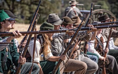 Confederate troops prepare to fire on the Union Army during a Civil War reenactment in Anderson, California. Photo taken on: September 27th, 2014