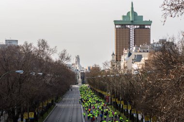 İspanya, Madrid: Uluslararası Af Örgütü, Suriye Halk Destek Derneği ve Madrid Eylem Ağı tarafından 21 Şubat 2016 tarihinde Madrid şehir merkezinde düzenlenen bir yardım yarışı sırasında insanlar koşuyor.