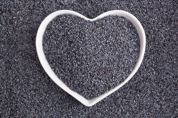 Poppy Seed Background Heart Form — Stock Photo, Image