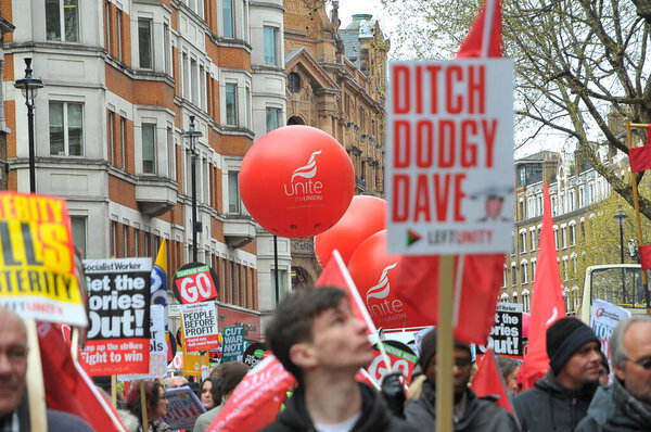 London, UK. 11th March 2023. Protesters at the SOS NHS National Demo in central London, supporting striking healthcare workers and in protest of the crisis caused by government cuts and mismanagement