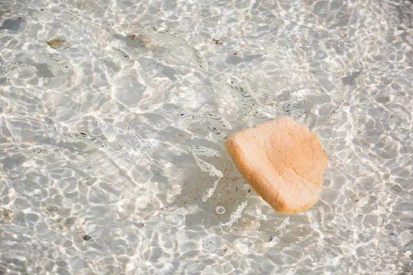 Closeup Shot Piece Bread Water — Stock Photo, Image