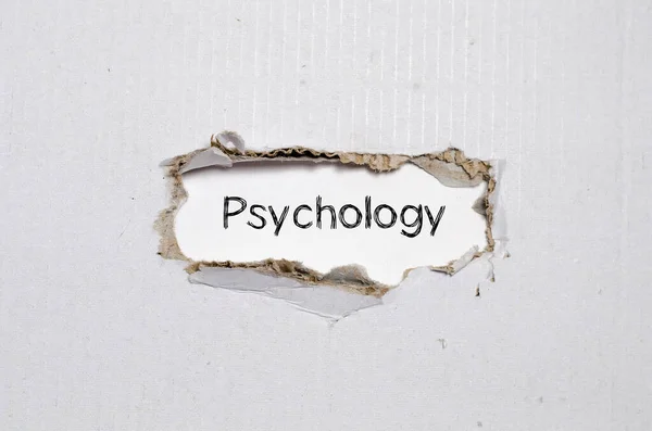 在撕碎的纸片后面出现的词心理学 — 图库照片