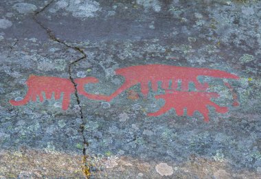 red Petroglyphs on the ground