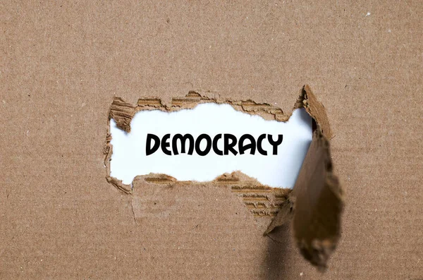 Mot Démocratie Qui Apparaît Derrière Papier Déchiré — Photo