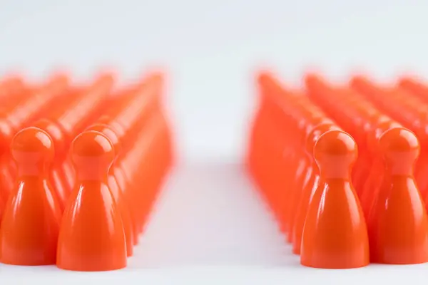 Conceptual Orange Game Pawns — Stock Photo, Image