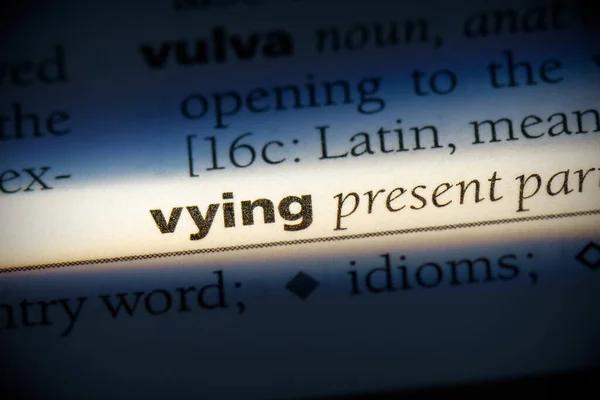 Vying Word Highlighted Dictionary Close View — Stock Photo, Image