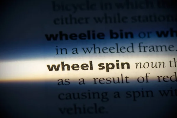 辞書で強調表示されている車輪の回転単語は — ストック写真