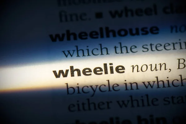 Wheelie Word Highlighted Dictionary Close View — Stock Photo, Image