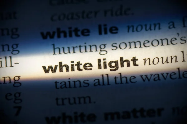 Sözlükte Vurgulanmış Beyaz Işık Sözcüğü Görünümü Kapat — Stok fotoğraf