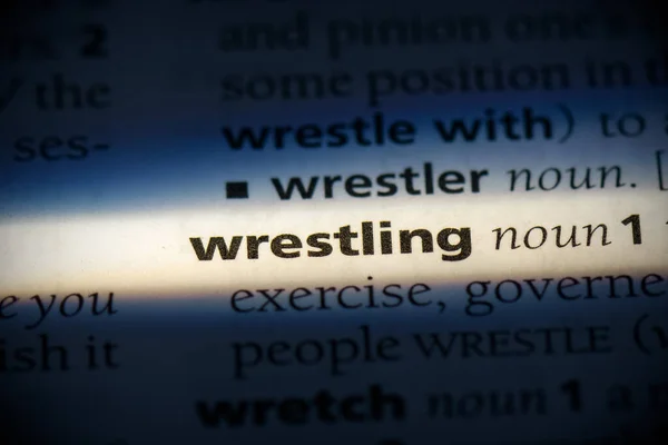 Parola Wrestling Evidenziato Nel Dizionario Vista Vicino — Foto Stock