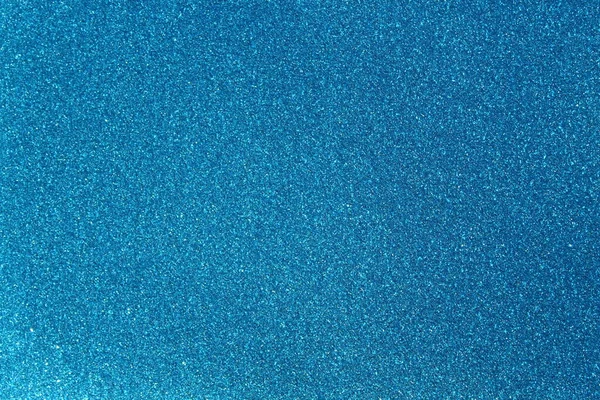 background with blue glittery paper