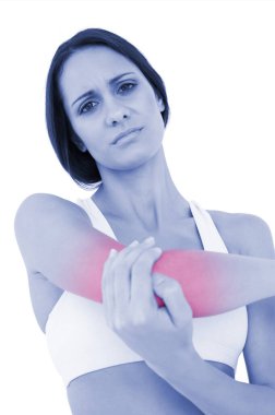 dirsek ağrısı ile zinde bir genç kadının portresi