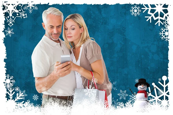 Composite Image Happy Couple Shopping Bags Smartphone — Stockfoto