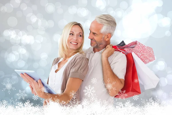 Composite Image Happy Couple Shopping Bags Tablet — Stok fotoğraf