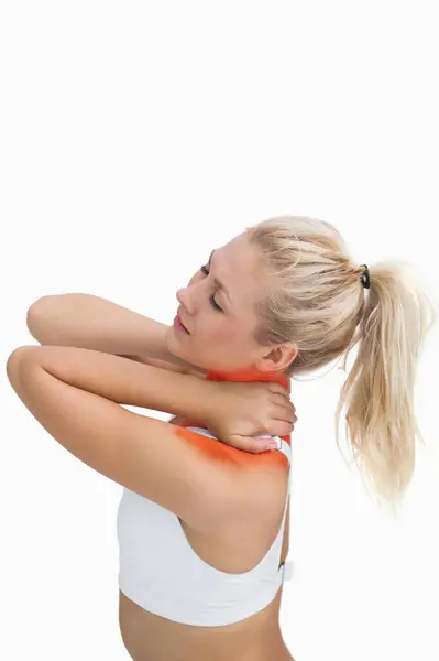 运动年轻女子按摩颈部的侧视图 — 图库照片