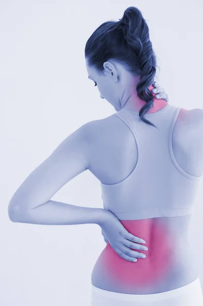 Vista Trasera Una Mujer Tonificada Con Dolor Espalda Contra Pared — Foto de Stock
