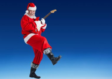 Mavi arka planda gitarı olan Noel Baba