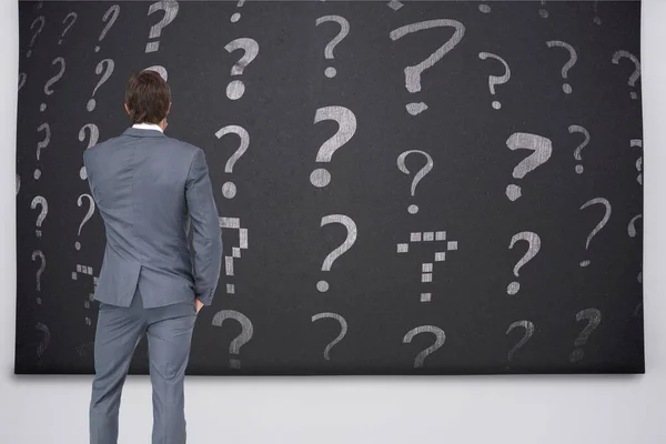Businessman Standing Front Question Marks — Stock Photo, Image