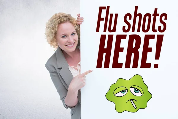 Frau Zeigt Hier Auf Ein Plakat Mit Grippeimpfungen — Stockfoto