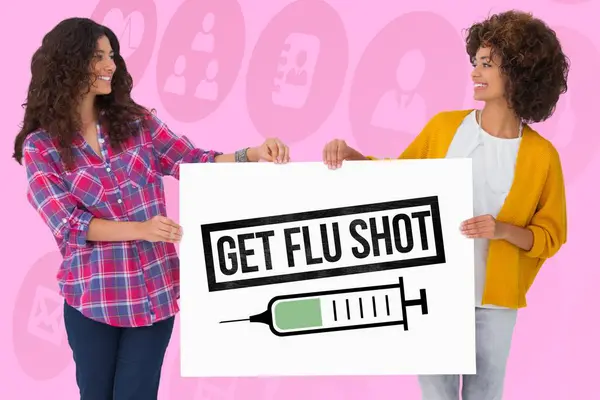 Women holding a get flu shot sign