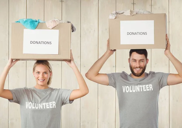 Composto Digital Voluntários Segurando Caixas Doação — Fotografia de Stock