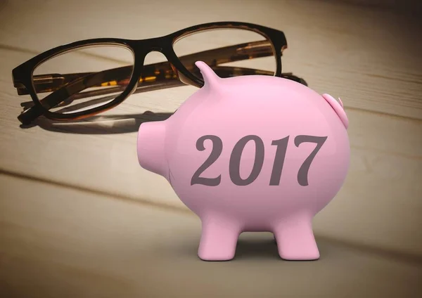 Digital composite of piggy bank and glasses