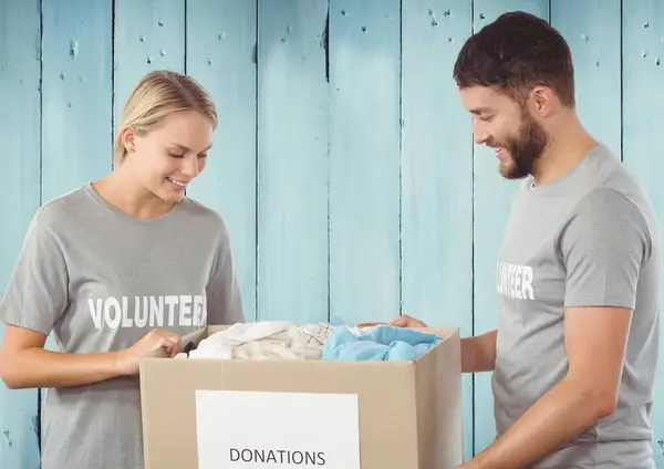 Compuesto Digital Voluntarios Que Reciben Caja Donación —  Fotos de Stock