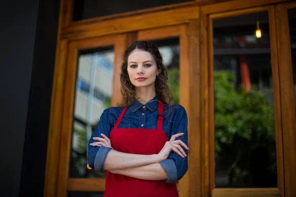 Portrait Smiling Waitress Standing Arms Crossed — Stock Photo, Image
