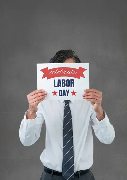 Businessman Holding Labor Day Card — Stock Photo, Image