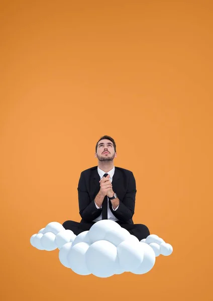 Worried business man praying sitting on a cloud