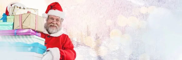 有冬季风景的圣诞老人带着礼物 — 图库照片