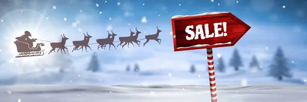 圣诞冬季景观中的木制路标以及圣诞老人雪橇和驯鹿的销售文本 — 图库照片