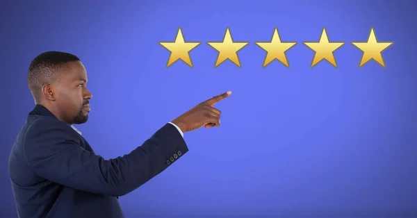 Five star review rating and businessman pointing