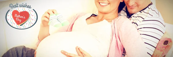 Composite Image Portrait Happy Pregnant Woman Holding Baby Shoes Her — Stock Photo, Image
