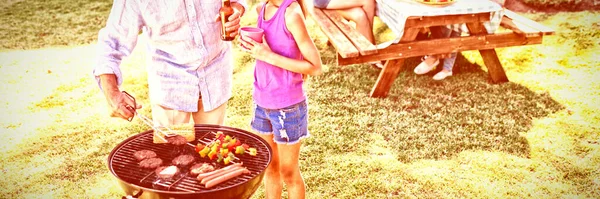 Grandfather Granddaughter Preparing Barbecue While Family Having Meal — Stock Photo, Image