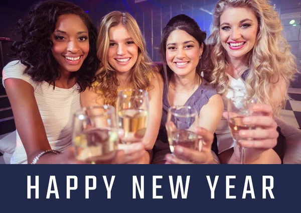 Happy New Year Women holding sparkling wine glasses