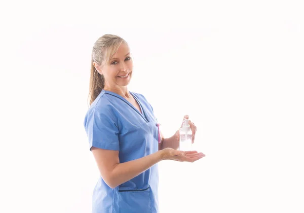 Sygeplejerske Eller Sundhedspersonale Demonstrerer Hånd Sanitizer - Stock-foto